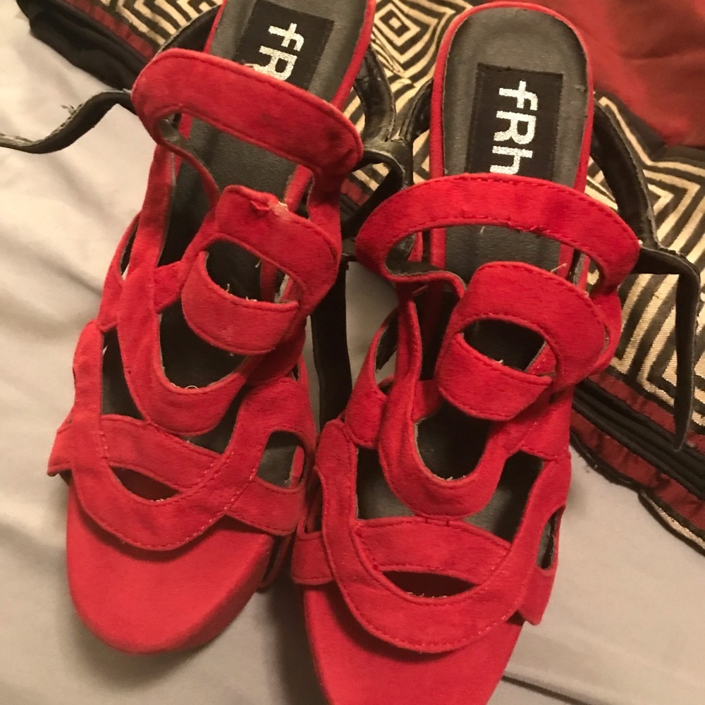Frh size 9 fits like a 8.5 red and black heels
